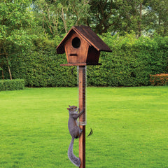 Slinky Scram, Squirrel attached to a bird feeder pole