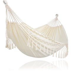 SUNCREAT Portable Camping Hammock in beige with tassels, front view