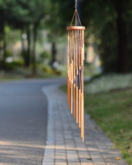 SuninYo wind chimes displayed in a garden setting