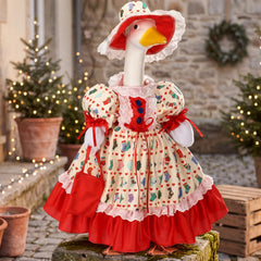 Suzile Christmas Goose Outfit Set with hat and bag on a porch