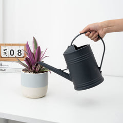 Tennedriv Green watering can showing wide opening for easy filling