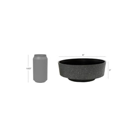 The HC Companies Capri Bowl in a garden setting