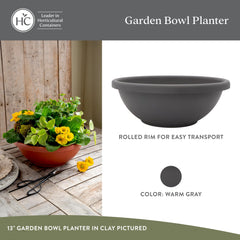 The HC Companies Shallow Planter with flowers in it
