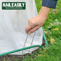 TiTifield landscape staples secured in soil
