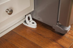 Tomcat Press 'N Set Mouse Trap, trap in use against a wall