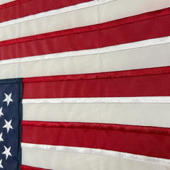TOPFLAGS American Flag Garden Flag displayed in a garden setting