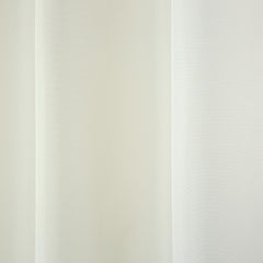 TOWN & COUNTRY BASICS Cabana Solid Heavyweight Curtain panels hanging on a patio