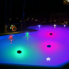 Two DeeprBetter Floating Pool Lights on water surface