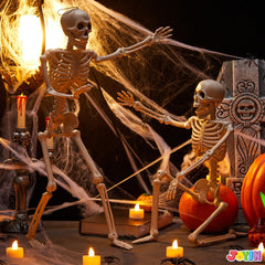 Two JOYIN skeletons displayed in a yard