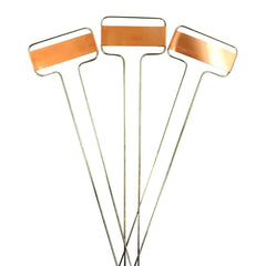 Ugold Copper Plant Labels on a garden table