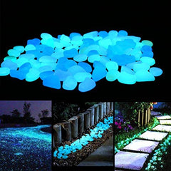Unime Glow in The Dark Garden Pebbles blue stones in a decorative setting