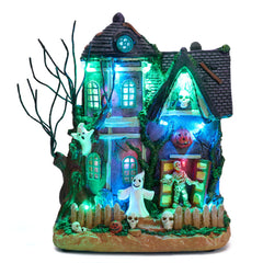 Valery Madelyn Halloween Village House front view with colorful lights
