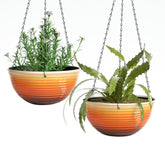 Vanslogreen 12 Inch Glazed Hanging Planter in Orange, front view