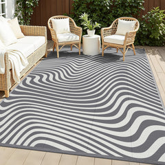 Vaukki 5x8 waterproof outdoor rug in grey striped design front view