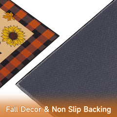 Vaukki Entryway Mat on a porch with autumn decor