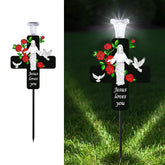VKEVOC Solar Jesus Cross Memorial Stake front view with roses