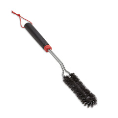 Weber Detail Brush in use cleaning hard-to-reach grill areas