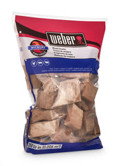 Weber Hickory Wood Chunks in use on a grill with meat