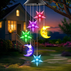 Winzwon Solar Moon Star Wind Chimes in multicolor hanging outdoors
