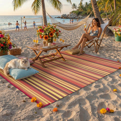 WondRg Outdoor Plastic Straw Rug 5' x 8' Red/Orange Stripe on patio
