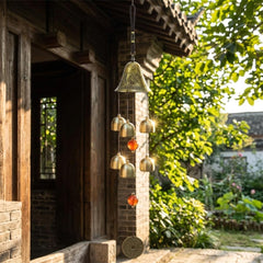 XUJIQI Lucky Wind Chimes hanging in a garden
