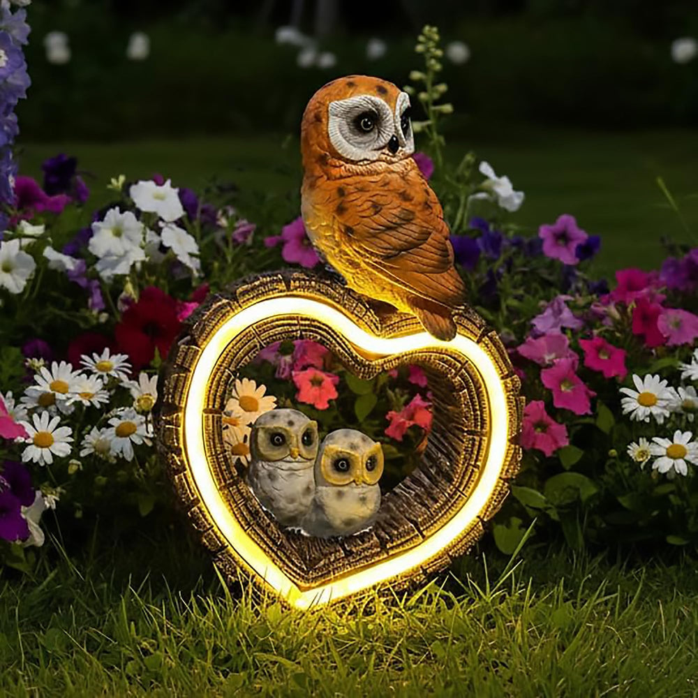 xxoasis Solar Garden Owl Statue front view with glowing heart light