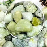 YISZM 5lbs jade pebbles in a decorative setting