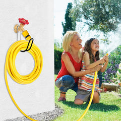 Yoniccal Garden Hose Holder mounted on a wall with a hose