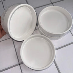 Yukfona ceramic plant saucer in use under a flower pot