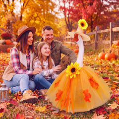 23-inch porch goose statue dressed in fall costume outdoors