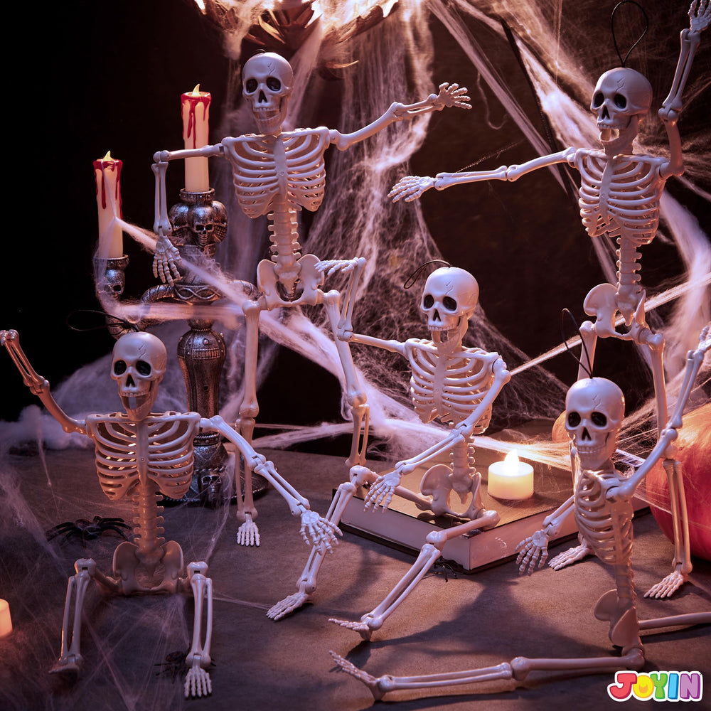 5 JOYIN skeletons arranged in a graveyard scene