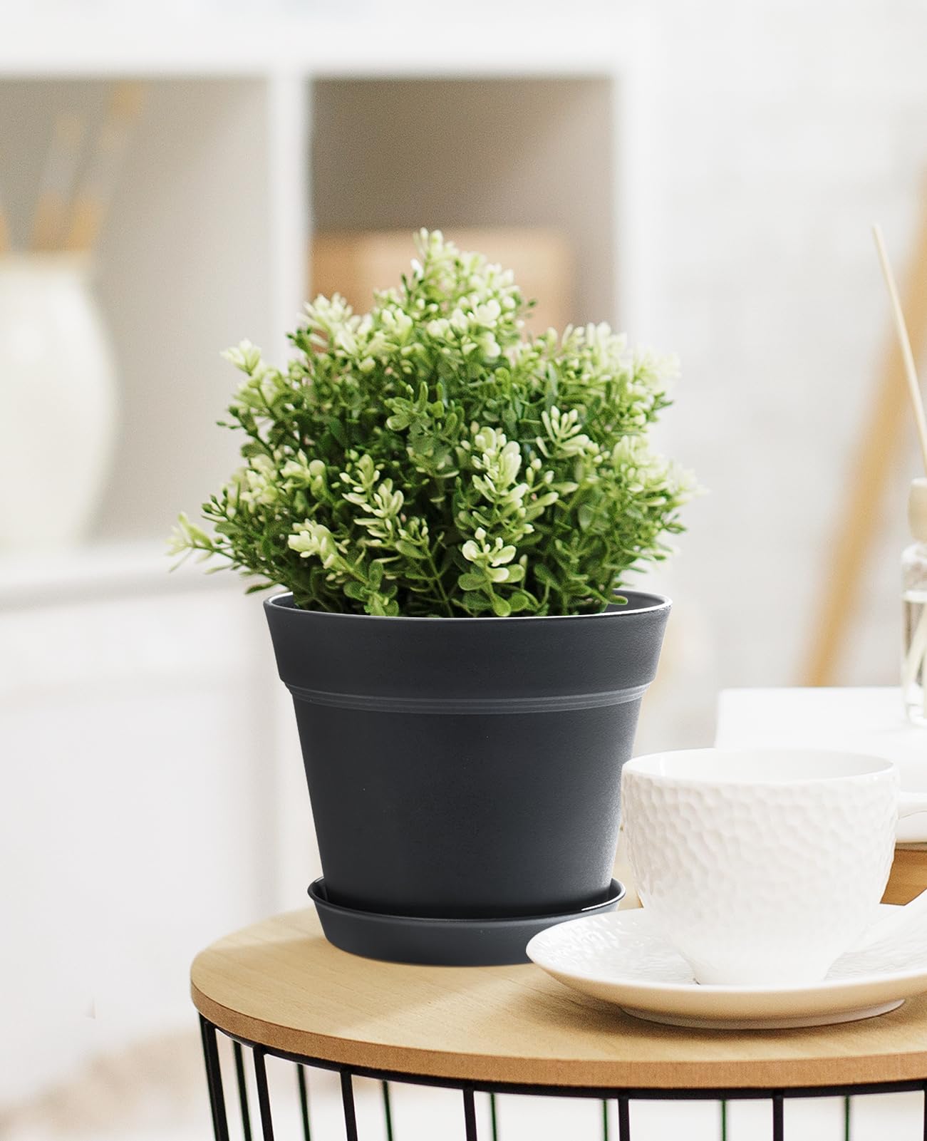 8 pieces of homenote flower pots displayed on a windowsill
