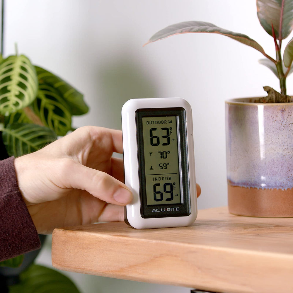 AcuRite Digital Thermometer mounted on a wall