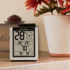 AcuRite hygrometer placed on refrigerator