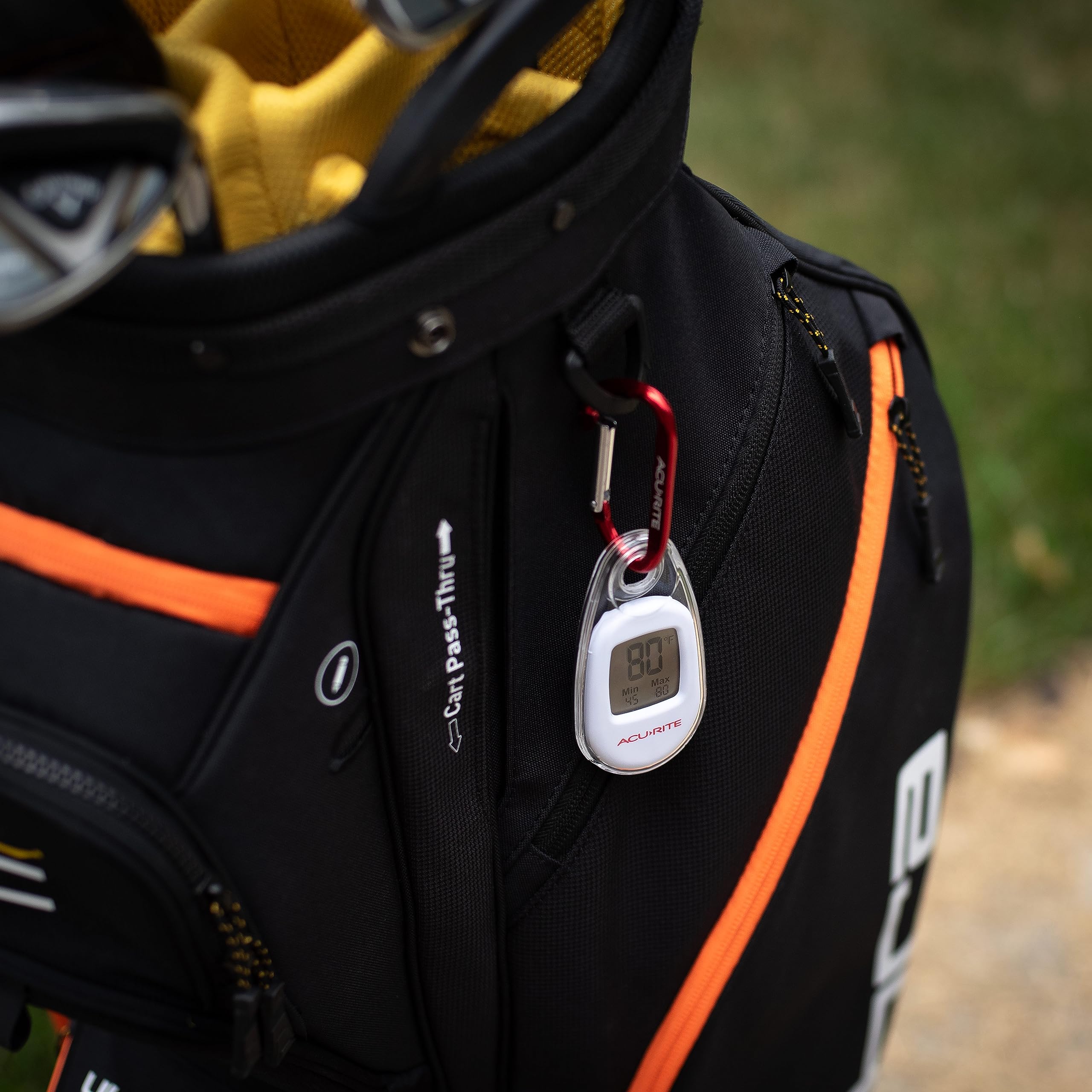 AcuRite thermometer attached to a backpack