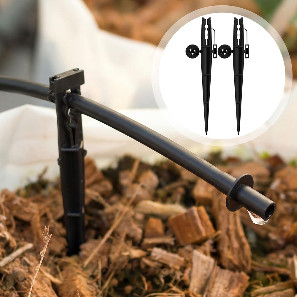 Afarnook stakes securely holding irrigation tubing in garden