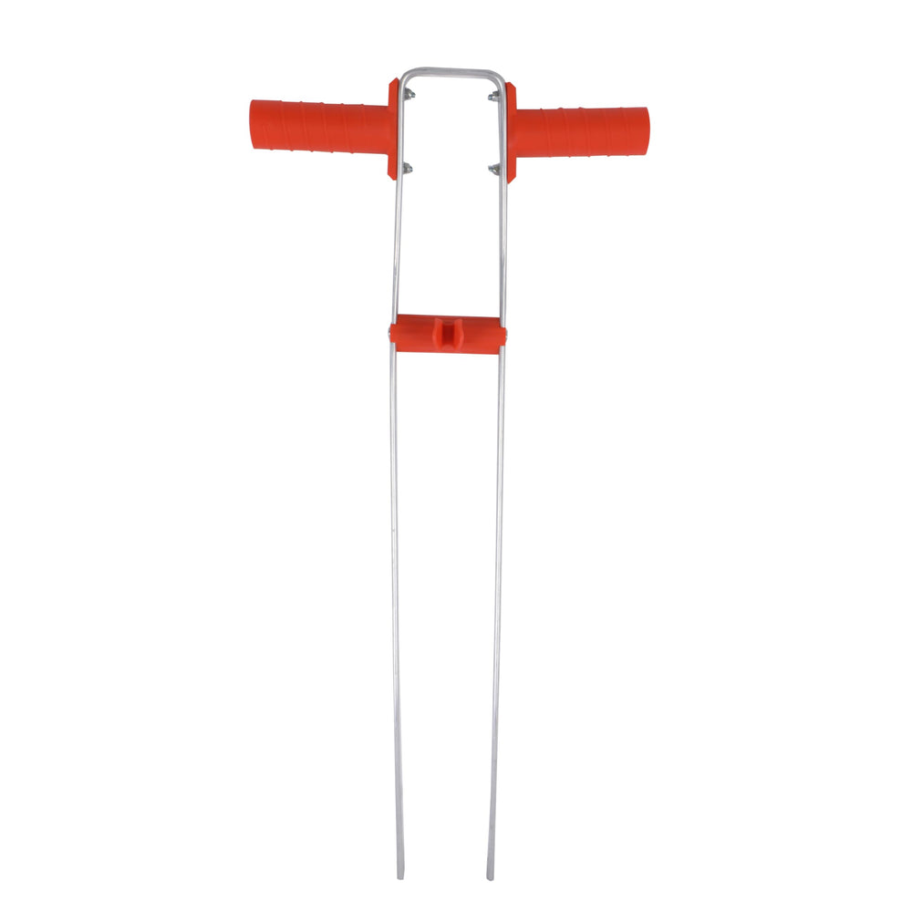Agri-Fab Push Garden Seeder in a garden setting