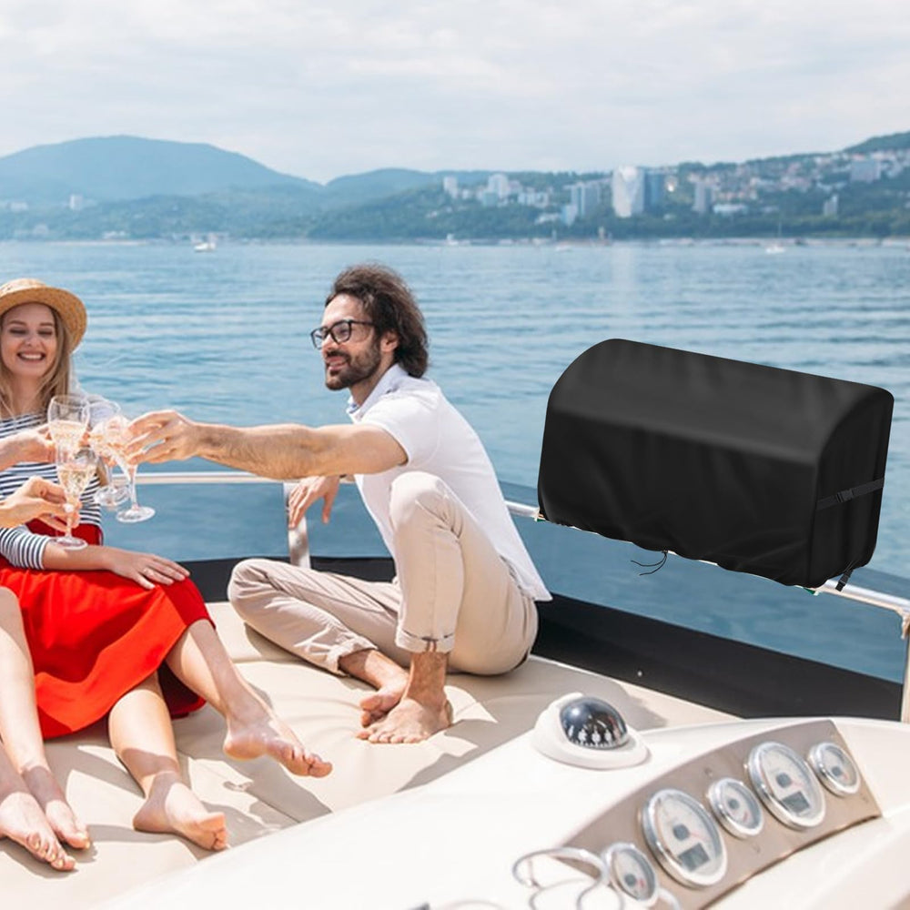 Agustone Boat Grill Cover in outdoor setting