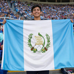 AhfuLife Guatemala Flag displayed in a garden setting