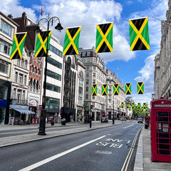 AhfuLife Jamaica Flag hanging on a balcony