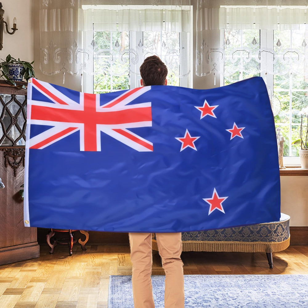 AhfuLife New Zealand Flag hanging on a balcony