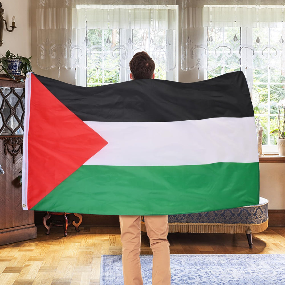 AhfuLife Palestine Flag hanging on a balcony