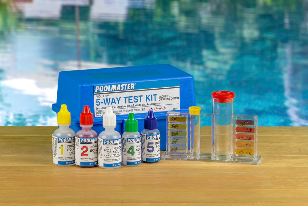 All components of Poolmaster 5-Way Water Test Kit laid out