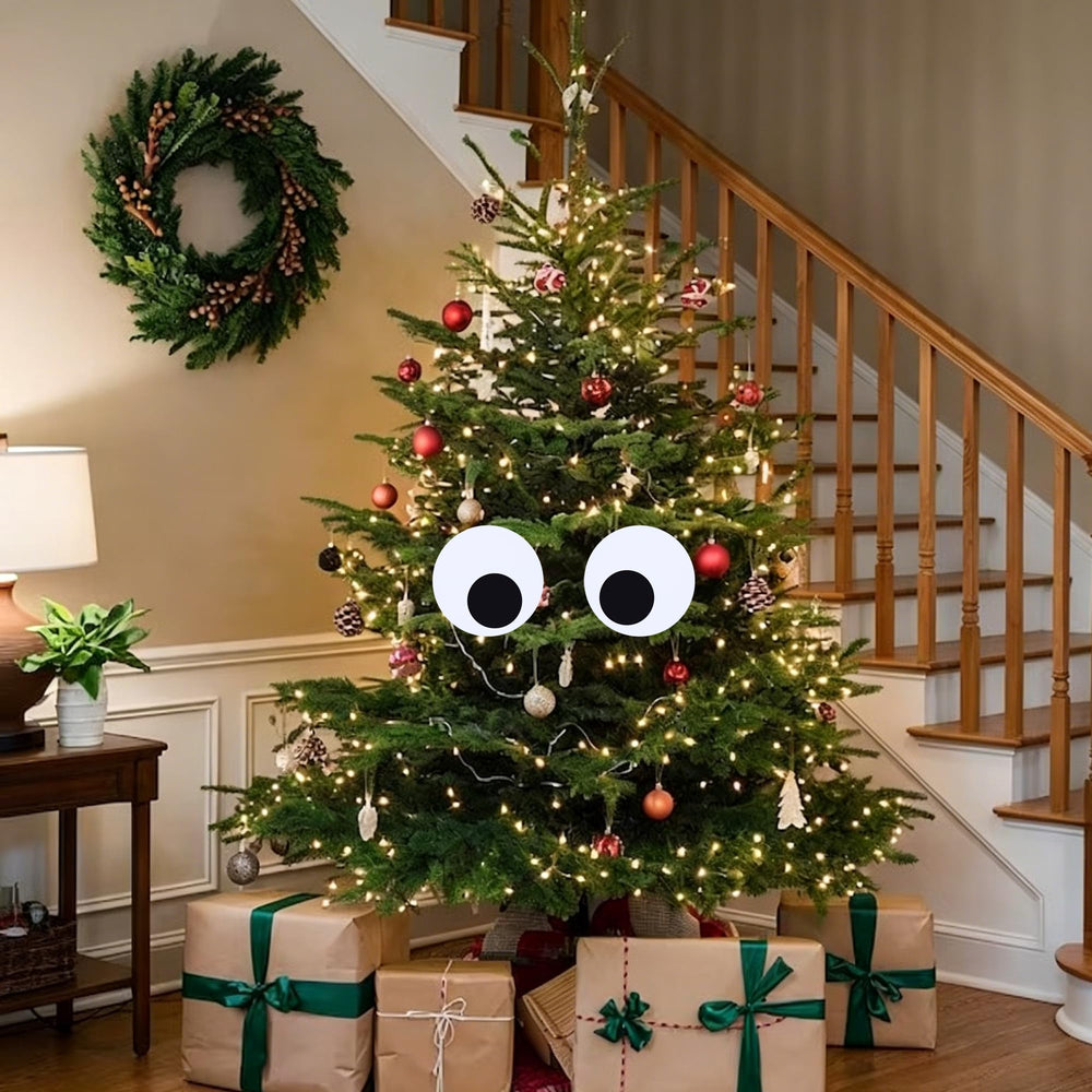 All sizes of UYEDUJZ Halloween eyeballs on a shrub