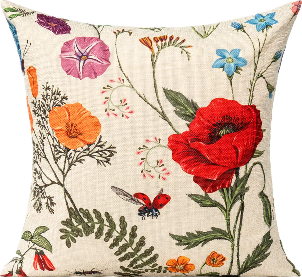 All Smiles outdoor pillow covers arranged on a garden bench