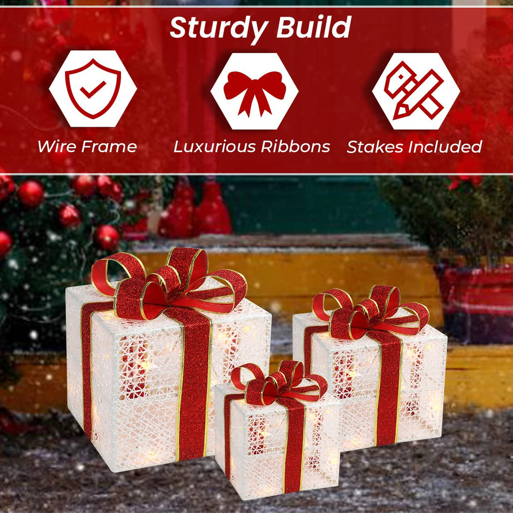 All three lighted gift boxes stacked for easy storage