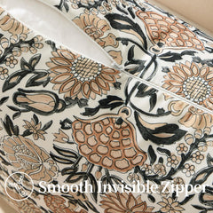 Allorry outdoor pillow cover against a garden backdrop