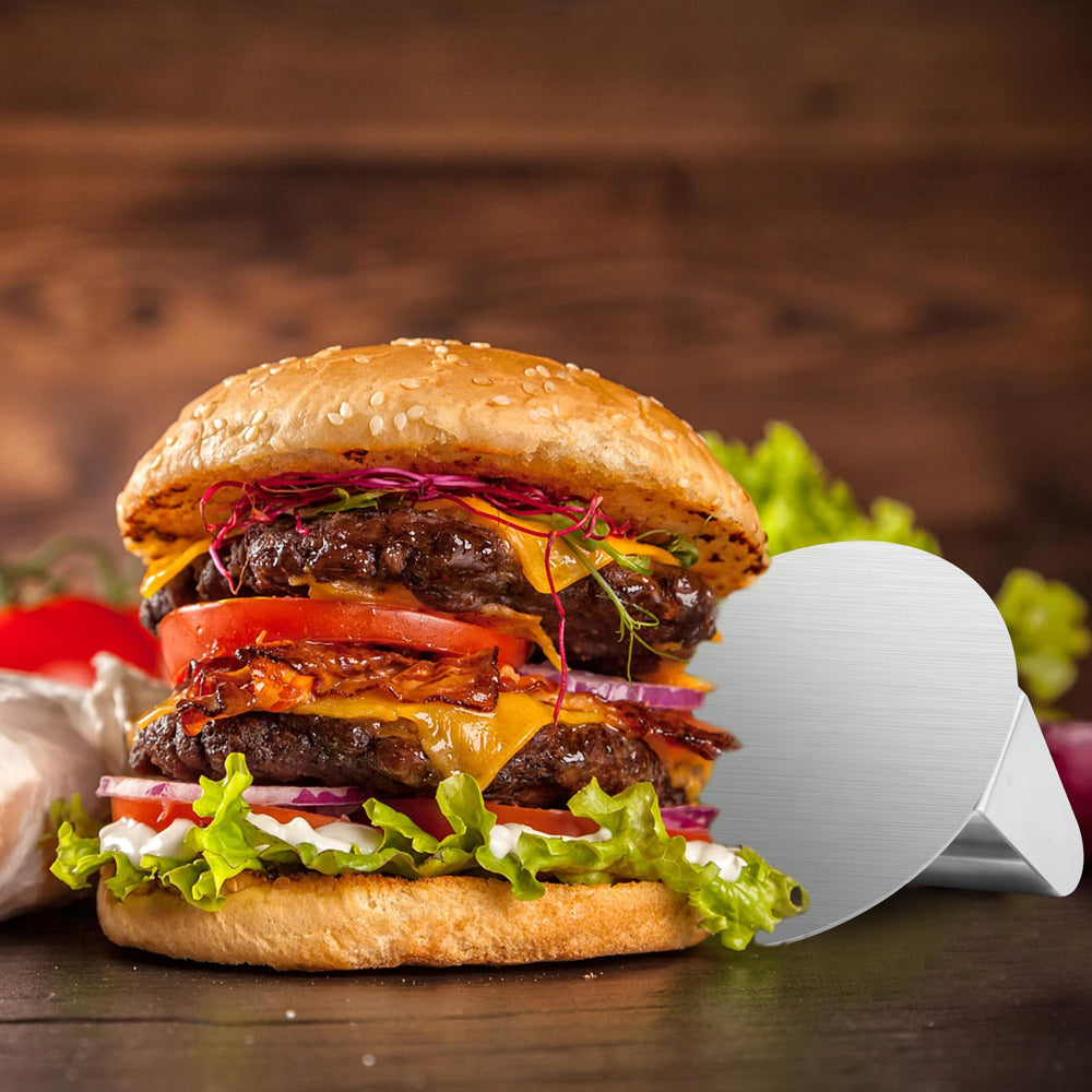 ALLTOP Smash Burger Press on a flat top grill