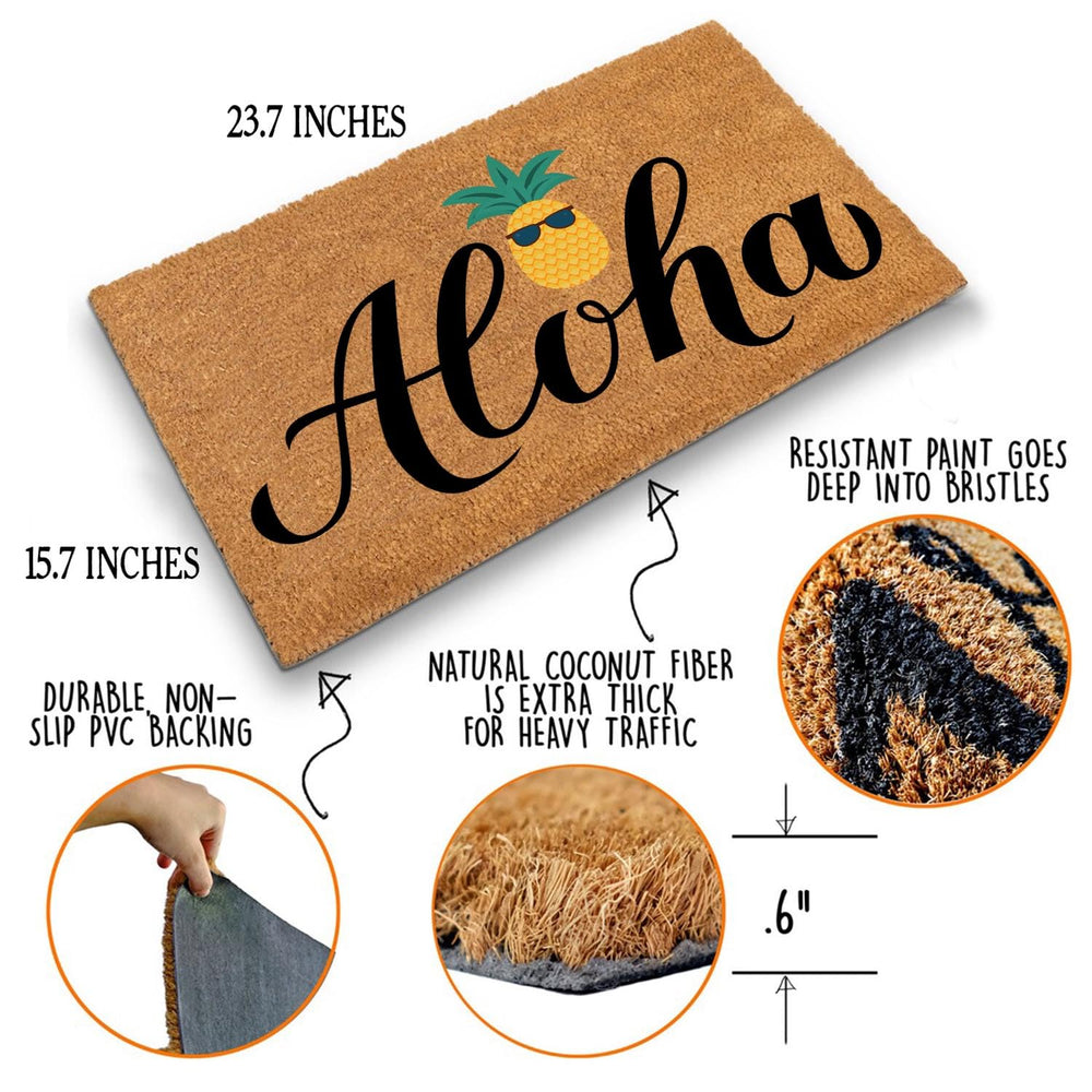 Aloha Pineapple Doormat being cleaned with a vacuum