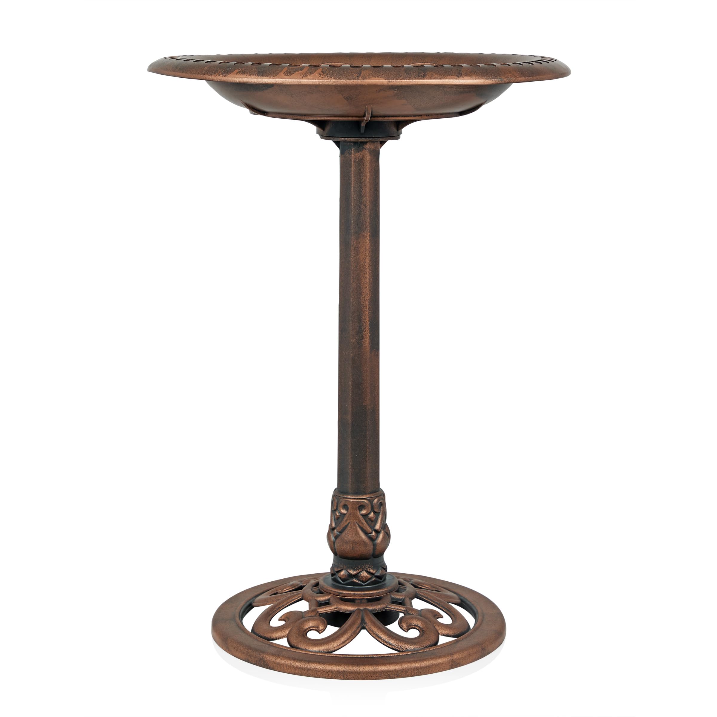 Alpine birdbath with water and flowers around it